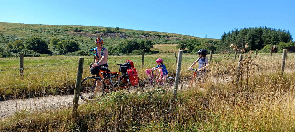 James O'Halloran cycling with kids in Wales